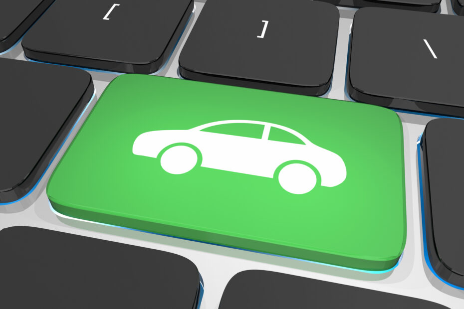 Green keyboard key with car icon symbolizing digital and omnichannel auto shopping experience for credit union members.